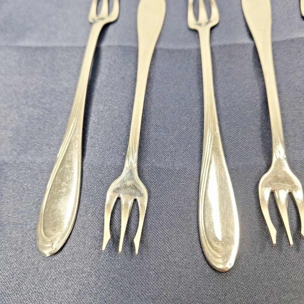 6 Oneida Silver Stainless Camber Cresta Windswept Scroll Cocktail Forks + 4 read